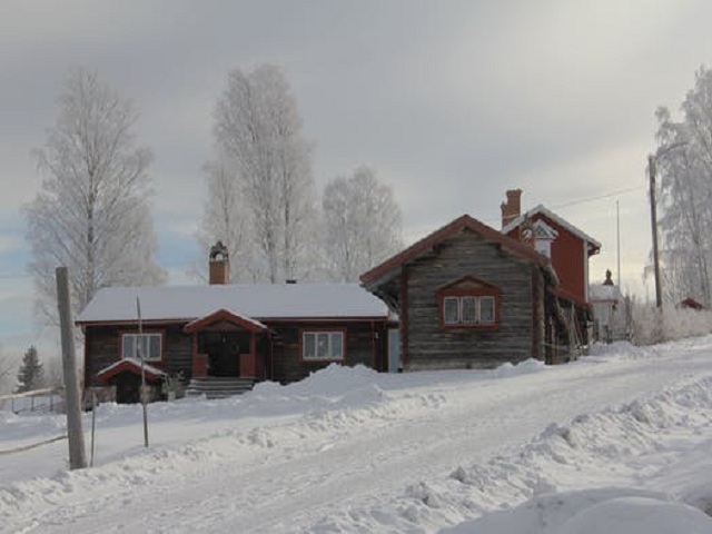 Hus i vinterlandskap